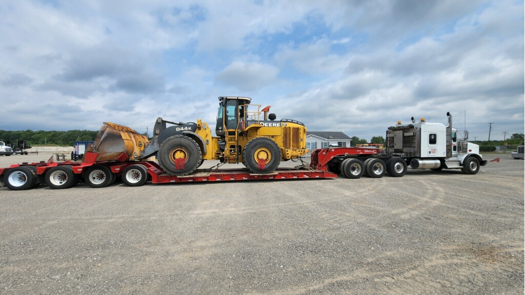 John Deere wheel loader on a lowboy